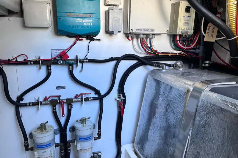 Slide: The Image of Electrical and plumbing systems inside a 2006 Fairline Targa 40 yacht. - 32