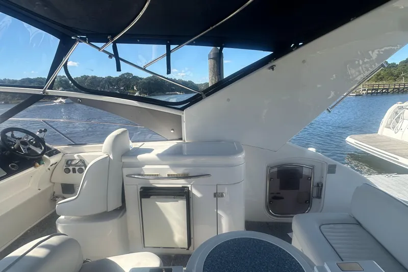 Slide: The Image of Interior view of 2006 Fairline Targa 40 yacht, featuring helm and seating area. - 9