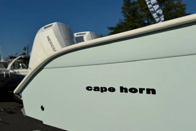 Slide: The Image of 2026 Cape Horn 36 XS boat with Mercury engines, side view. - 11