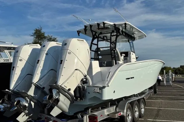 Slide: The Image of 2026 Cape Horn 36 XS boat with triple engines on a trailer. - 12