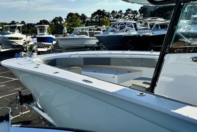 Slide: The Image of 2026 Cape Horn 36 XS boat in marina, surrounded by other vessels. - 15