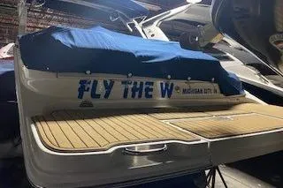 Slide: The Image of 2019 Sea Ray SDX 290 boat with "Fly the W" text on the stern. - 23