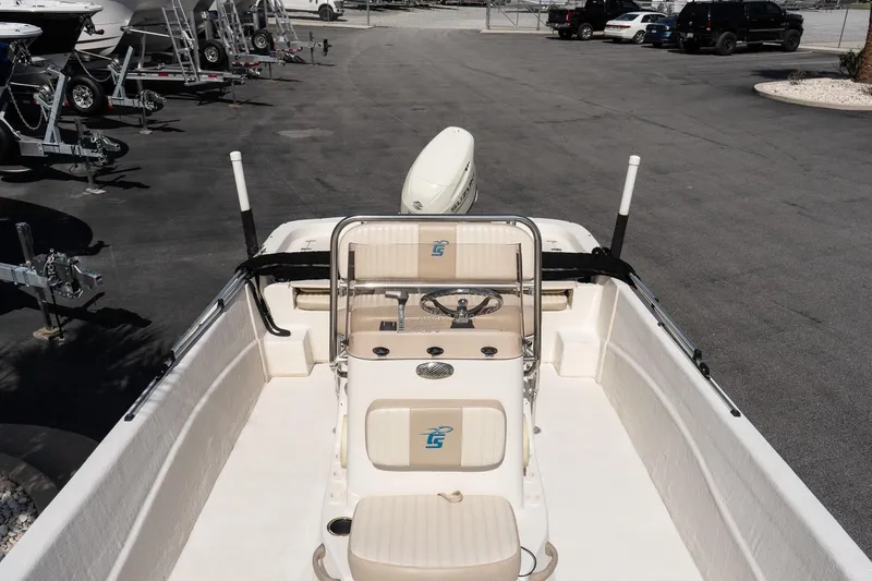 Slide: The Image of 2017 Carolina Skiff 218 DLV boat interior with steering console and seating. - 11