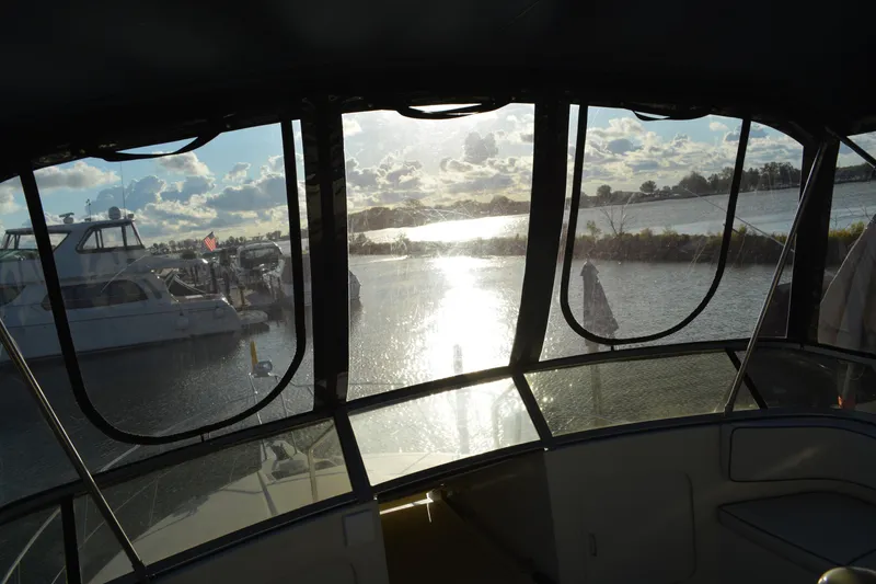 Slide: The Image of View from 1995 Carver 380 Santego boat, overlooking marina and sunset on the water. - 15