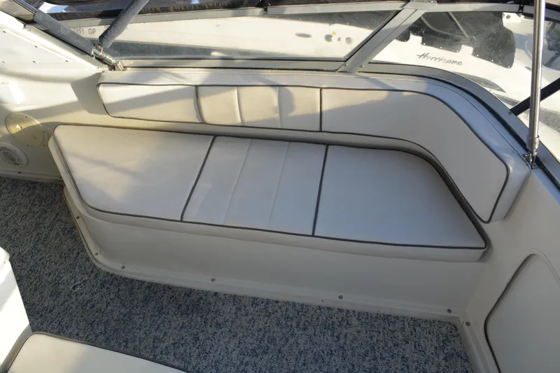 Slide: The Image of Interior seating of 1995 Carver 380 Santego boat with beige upholstery. - 19