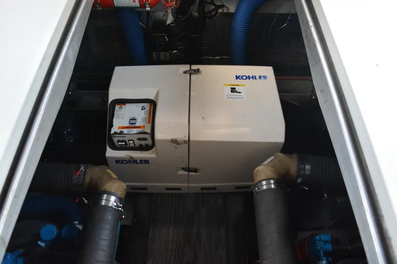 Slide: The Image of Engine compartment of a 1995 Carver 380 Santego with Kohler generator. - 46