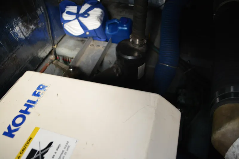 Slide: The Image of Engine room of 1995 Carver 380 Santego with Kohler generator and equipment. - 47