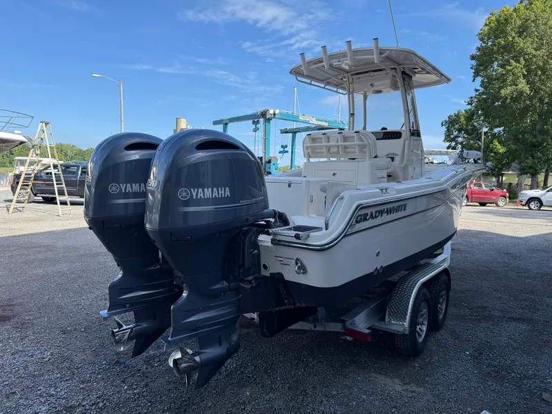 Slide: The Image of 2020 Grady-White Fisherman 257 boat with dual Yamaha engines on a trailer. - 9