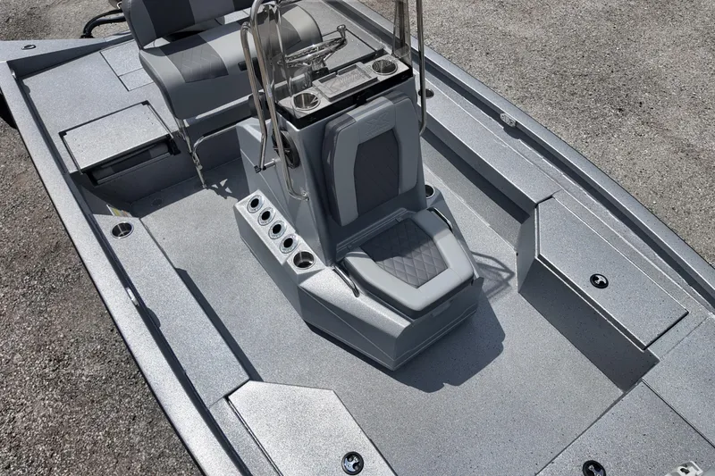 Slide: The Image of 2026 Express H20B Bay boat interior with seating and console, featuring a sleek, modern design. - 8