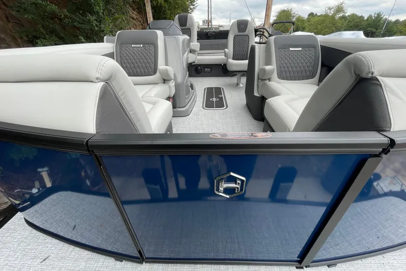 Slide: The Image of 2026 Harris Sunliner 210 pontoon boat interior with luxurious seating and modern design. - 4