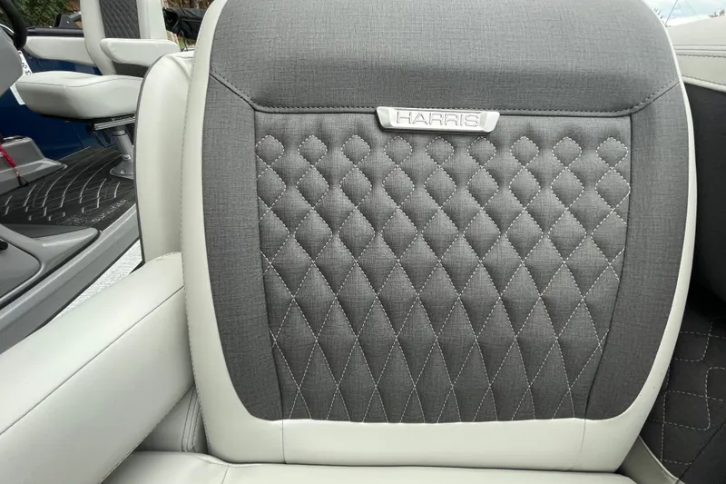 Slide: The Image of Luxurious seating on 2026 Harris Sunliner 210 boat with diamond-stitched upholstery. - 7