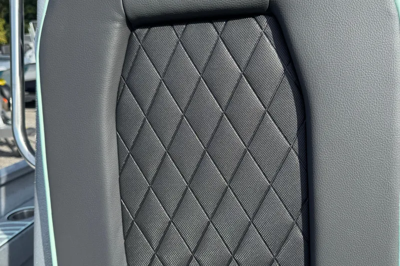Slide: The Image of Diamond-stitched seat detail on 2026 Xpress H22B Bay boat. - 14