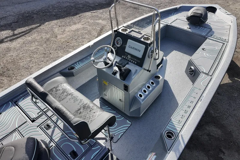 Slide: The Image of 2026 Xpress H22B Bay boat interior with Garmin system and stylish seating. - 6