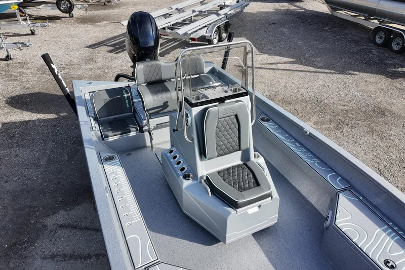 Slide: The Image of 2026 Xpress H22B Bay boat interior with modern seating and console design. - 8