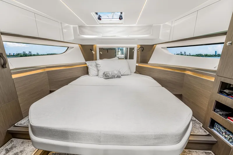 Slide: The Image of Luxurious cabin interior of 2025 Jeanneau NC 1295 Fly yacht with panoramic windows. - 30
