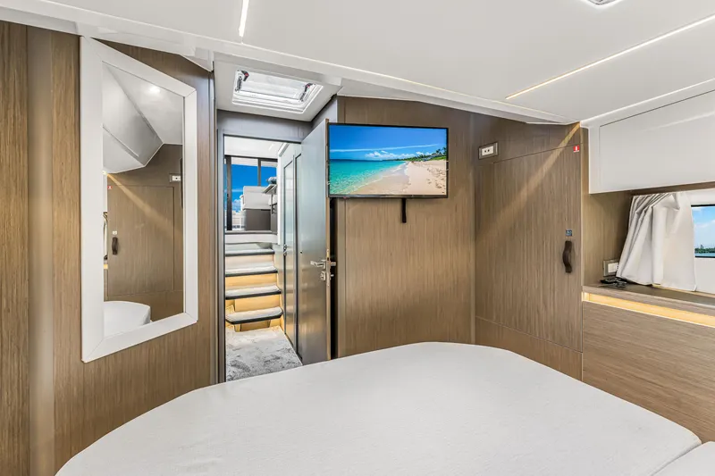 Slide: The Image of Luxurious interior of 2025 Jeanneau NC 1295 Fly yacht with modern amenities and elegant design. - 31