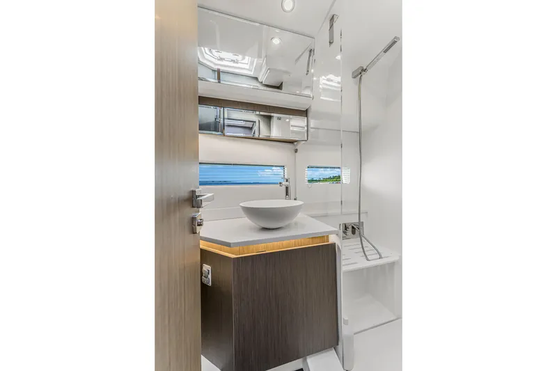 Slide: The Image of Modern bathroom interior of 2025 Jeanneau NC 1295 Fly yacht, featuring sleek design and fixtures. - 34