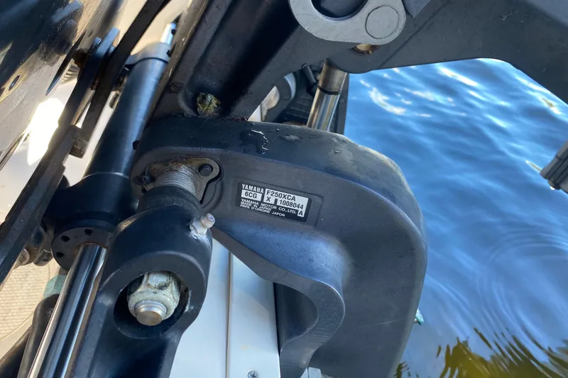 Slide: The Image of Close-up of Yamaha LF250XCA engine part on 2015 Grady-White Freedom 285 boat. - 22