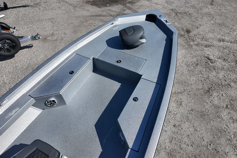 Slide: The Image of 2026 Xpress H24B Bay boat interior with seating and storage compartments. - 10