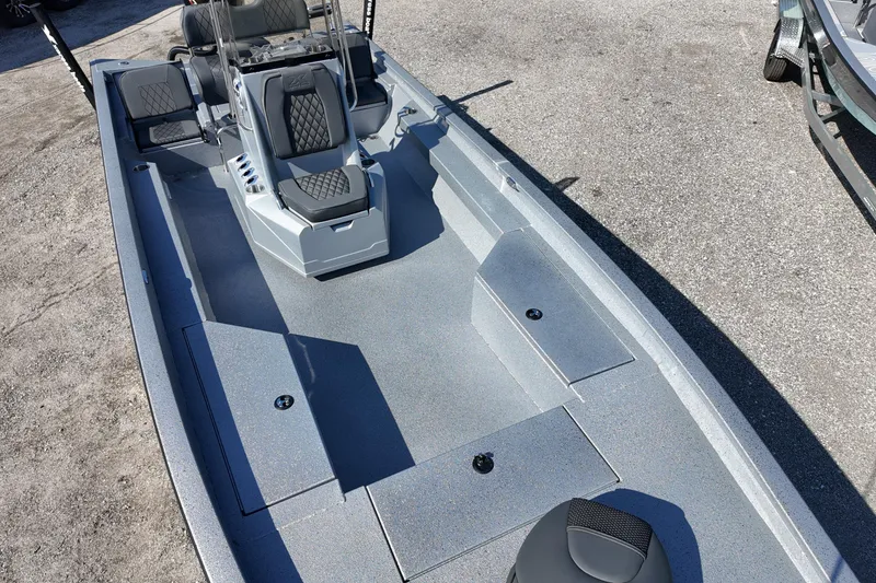 Slide: The Image of 2026 Xpress H24B Bay boat interior with sleek seating and storage compartments. - 11