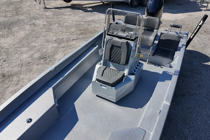 Slide: The Image of 2026 Xpress H24B Bay boat interior with modern seating and console design. - 13