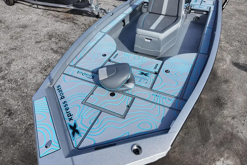Slide: The Image of 2026 Xpress X23B Bay Lounge boat with stylish deck design and seating. - 12