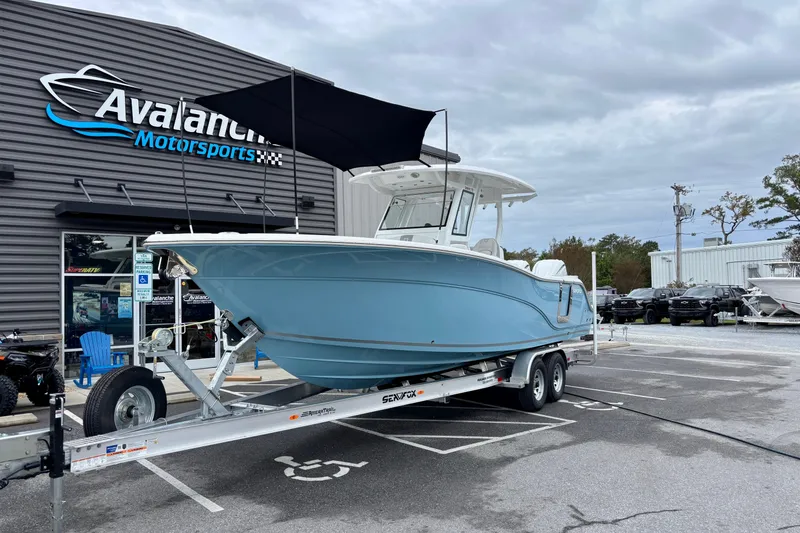 Slide: The Image of 2026 Sea Fox 288 Commander boat on trailer at Avalanche Motorsports dealership. - 7