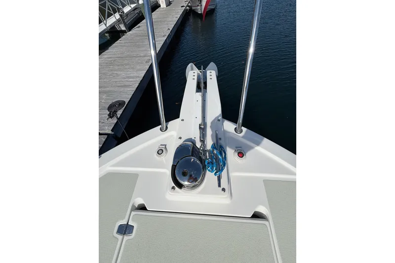 Slide: The Image of Bow of 2020 Back Cove 37 boat with anchor and blue rope at dock. - 11