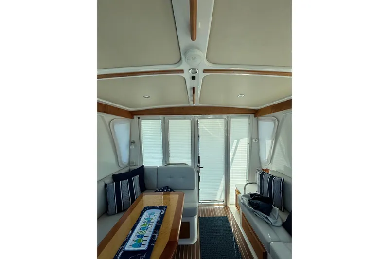 Slide: The Image of Interior of 2020 Back Cove 37 yacht with elegant seating and wooden accents. - 21