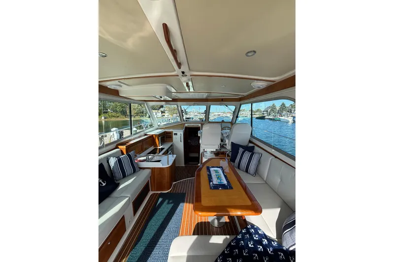 Slide: The Image of Interior of 2020 Back Cove 37 yacht with elegant seating and scenic water view. - 24