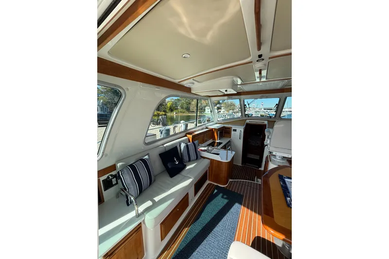 Slide: The Image of Interior of 2020 Back Cove 37 yacht with elegant seating and wood accents. - 25