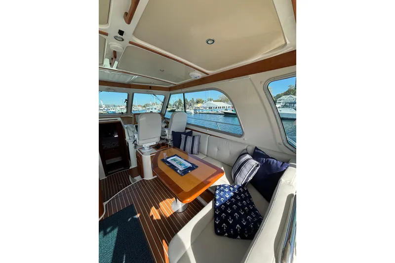 Slide: The Image of Luxurious interior of 2020 Back Cove 37 yacht with elegant seating and nautical decor. - 26