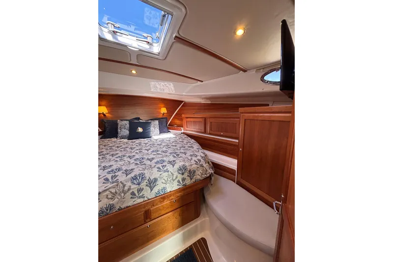 Slide: The Image of Luxurious cabin interior of 2020 Back Cove 37 yacht with elegant wood finish. - 37