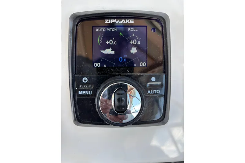 Slide: The Image of Control panel of a 2020 Back Cove 37 boat, displaying auto pitch and roll settings. - 55