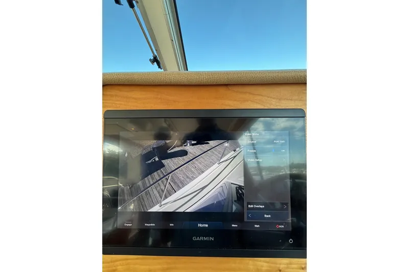 Slide: The Image of Garmin display on 2020 Back Cove 37 boat, showing video feed and menu options. - 58