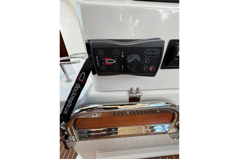 Slide: The Image of Control panel of a 2020 Back Cove 37 boat with Dockmate system. - 60