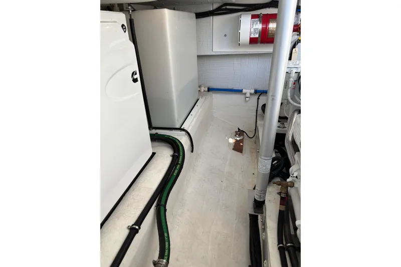 Slide: The Image of Engine room of 2020 Back Cove 37 boat, featuring equipment and wiring. - 70