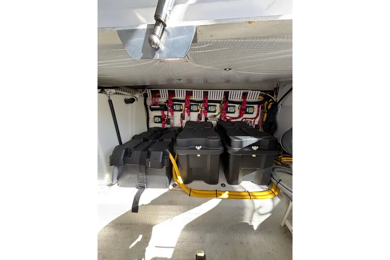 Slide: The Image of Battery compartment of 2020 Back Cove 37 boat with organized wiring and secure battery boxes. - 71