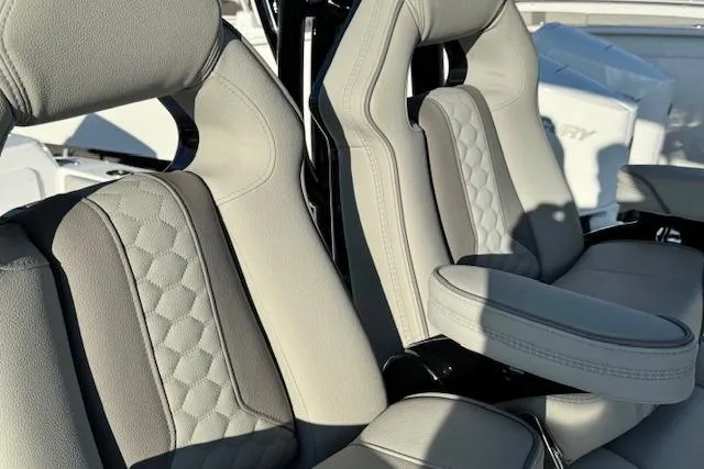 Slide: The Image of 2026 Cape Horn 34 XS boat seats with elegant stitching and armrest. - 16