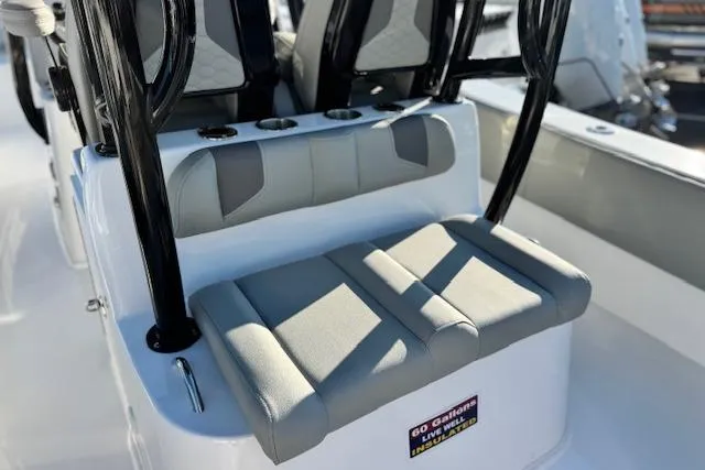 Slide: The Image of 2026 Cape Horn 34 XS boat seating with cup holders and storage. - 18