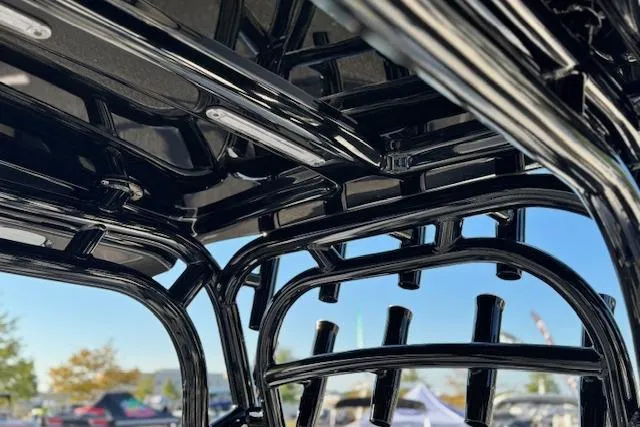 Slide: The Image of Close-up of 2026 Cape Horn 34 XS boat's sleek black metal framework. - 23