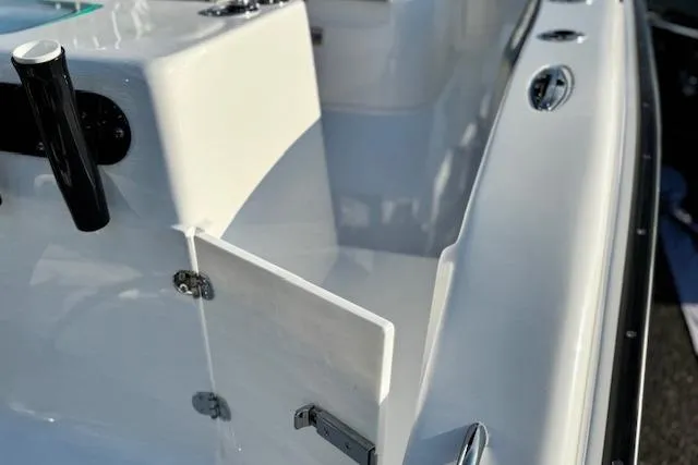 Slide: The Image of 2026 Cape Horn 34 XS boat interior detail with sleek white finish and hardware. - 25