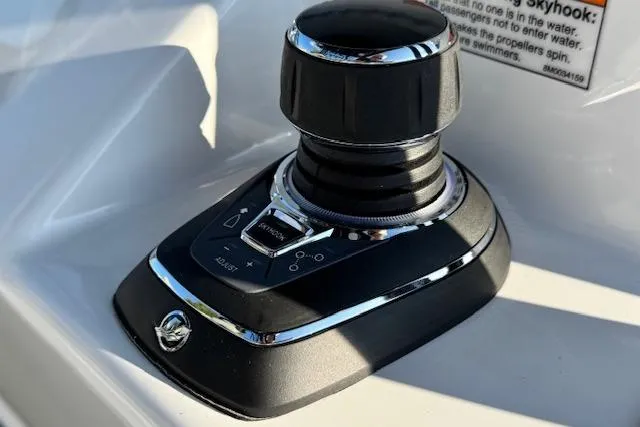 Slide: The Image of Joystick control on 2026 Cape Horn 34 XS boat dashboard. - 12