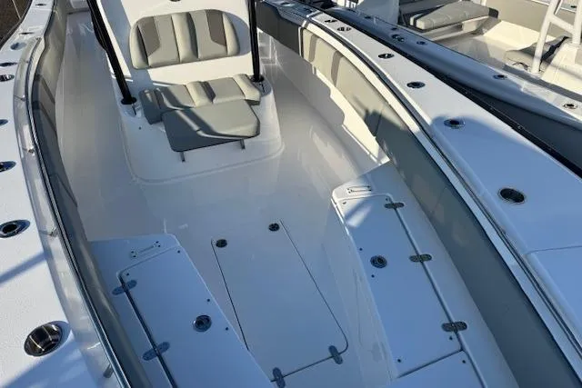 Slide: The Image of 2026 Cape Horn 34 XS boat interior with seating and storage compartments. - 15