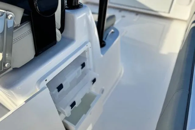 Slide: The Image of 2026 Cape Horn 34 XS boat interior with open storage compartments. - 17