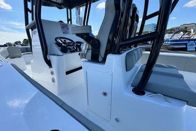 Slide: The Image of 2026 Cape Horn 34 XS boat interior with modern seating and steering console. - 7