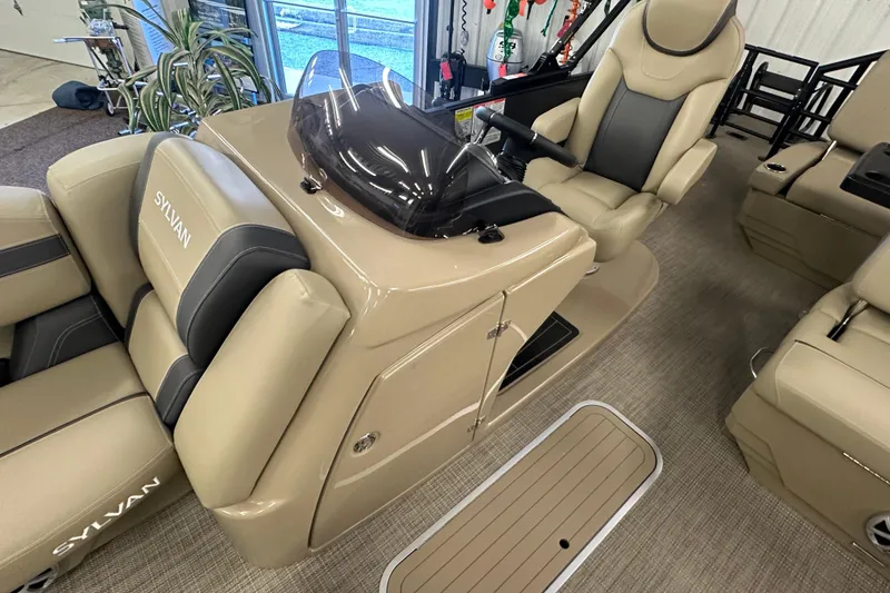 Slide: The Image of Luxurious interior of 2025 Sylvan L1 DLZ boat with plush seating and modern controls. - 11