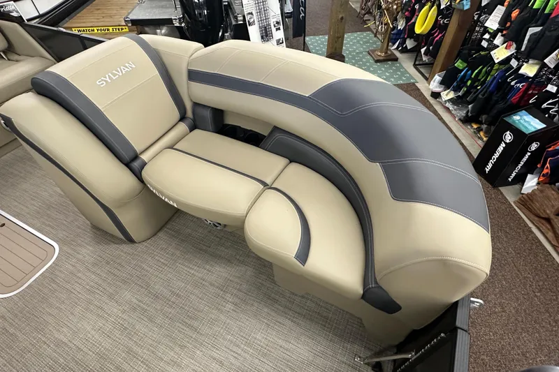 Slide: The Image of Luxurious seating in 2025 Sylvan L1 DLZ boat, featuring beige and gray upholstery. - 8