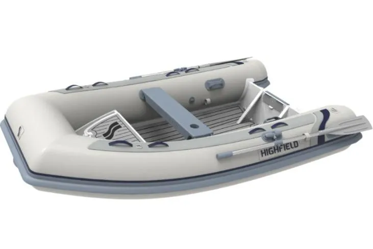 Slide: The Image of 2026 Highfield CL260 HYP inflatable boat, gray and blue design, side view. - 1