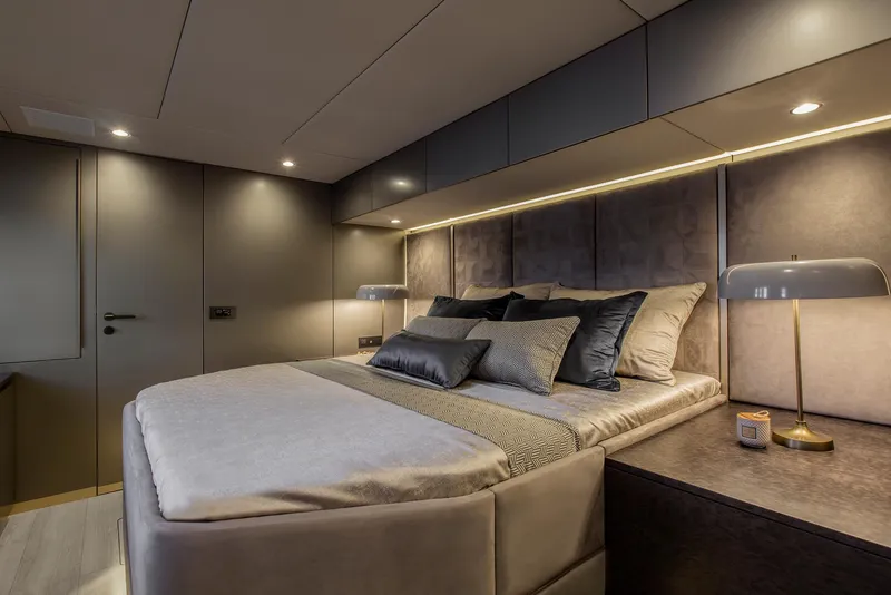 Slide: The Image of Luxurious bedroom interior of 2026 Sunreef 60 Sunreef Power yacht, featuring modern design and ambient lighting. - 13